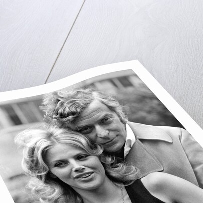 Michael Caine with Britt Ekland by Associated Newspapers