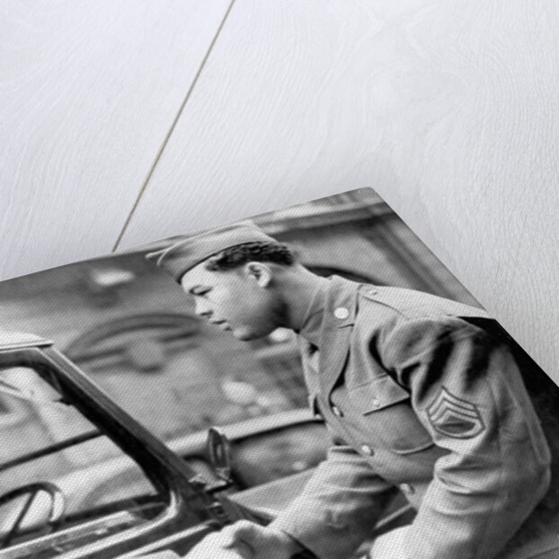 Boxer Joe Louis in uniform by Associated Newspapers