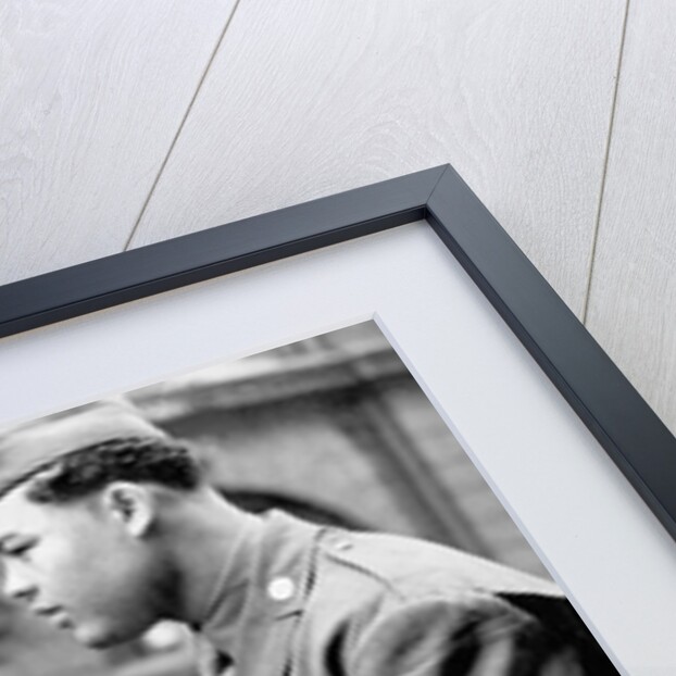 Boxer Joe Louis in uniform by Associated Newspapers