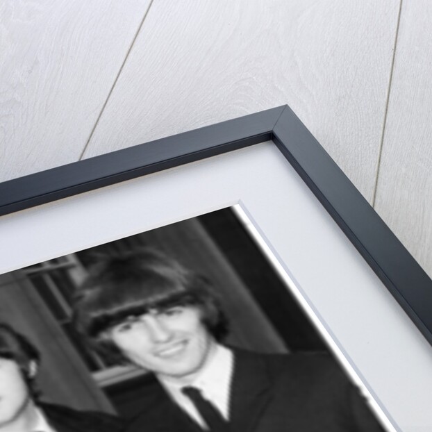 The Beatles show their MBEs by Associated Newspapers