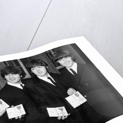 The Beatles show their MBEs by Associated Newspapers