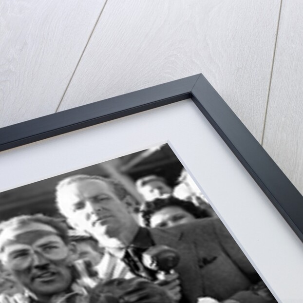 Sir Stirling Moss, racing driver after winning his first British Grand Prix in 1955 by Associated Newspapers