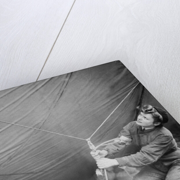 WAAF checking barrage balloon by Associated Newspapers