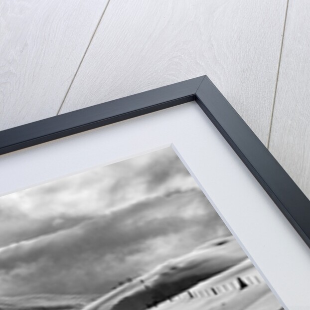 A shepherd in the snow by Associated Newspapers