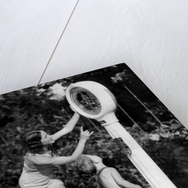 Seaside weighing machine by Associated Newspapers