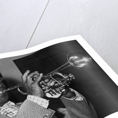 Louis Armstrong plays by Associated Newspapers