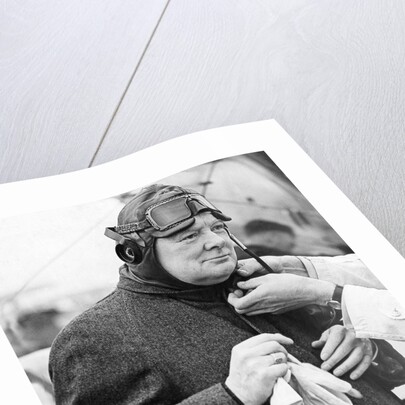 Winston Churchill in a flying helmet by Associated Newspapers