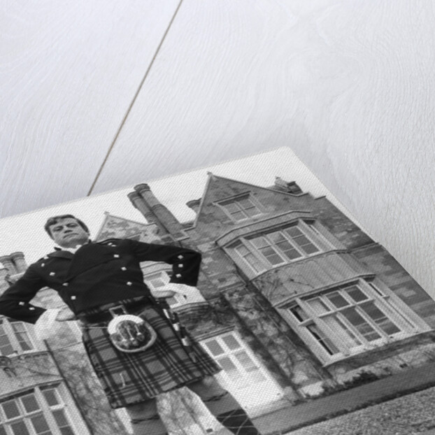 Oliver Reed in kilt by Associated Newspapers