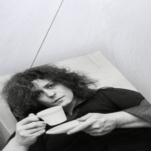 Marc Bolan with a cup of tea by Associated Newspapers