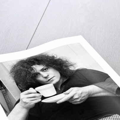 Marc Bolan with a cup of tea by Associated Newspapers
