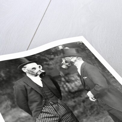 School boys trying out gas masks by Associated Newspapers