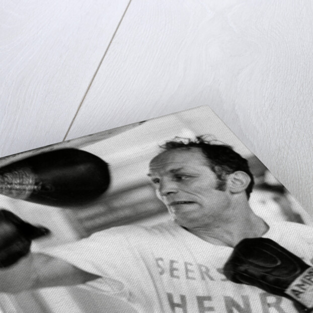 Henry Cooper, boxer, training by Associated Newspapers