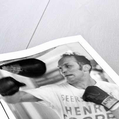 Henry Cooper, boxer, training by Associated Newspapers