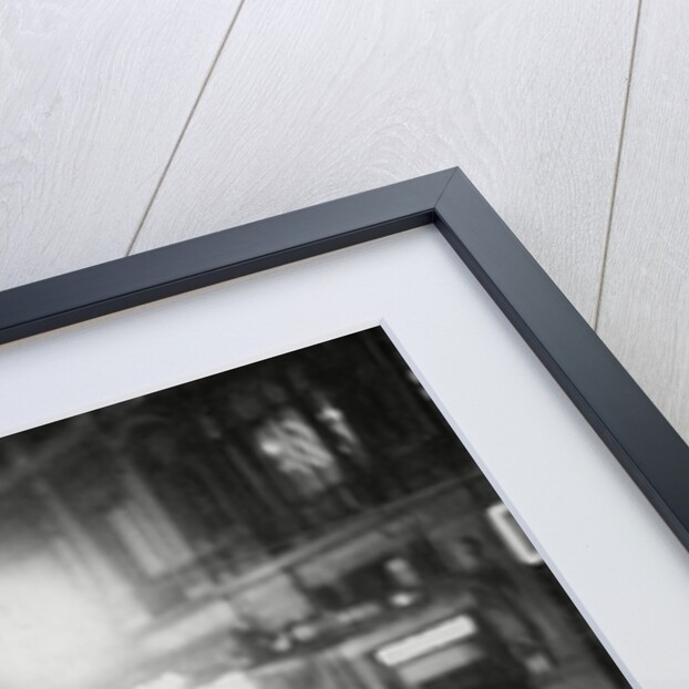 Flower Seller in the rain by Associated Newspapers