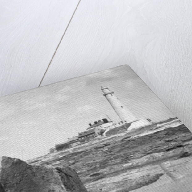 On the beach by the lighthouse at Whitley Bay by Associated Newspapers