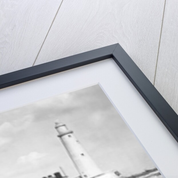 On the beach by the lighthouse at Whitley Bay by Associated Newspapers