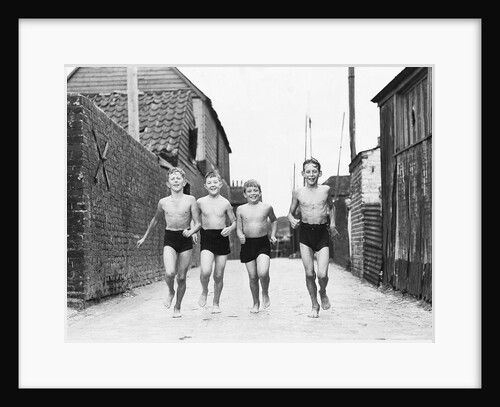 Children off for a swim by Associated Newspapers