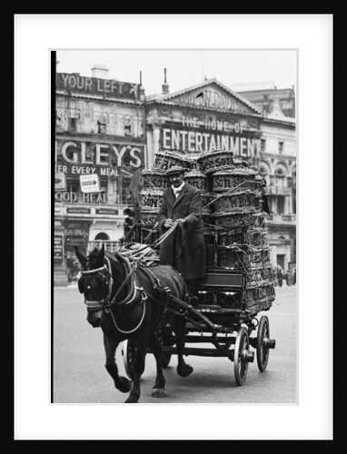 Horse and cart in Piccadilly Circus by Associated Newspapers