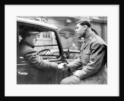 Boxer Joe Louis in uniform by Associated Newspapers
