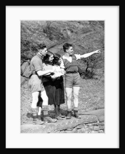 Are we lost? Hikers with a map by Associated Newspapers