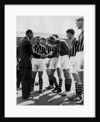 Prince Philip meeting members of Manchester City team by Associated Newspapers