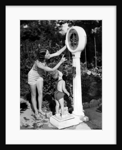 Seaside weighing machine by Associated Newspapers