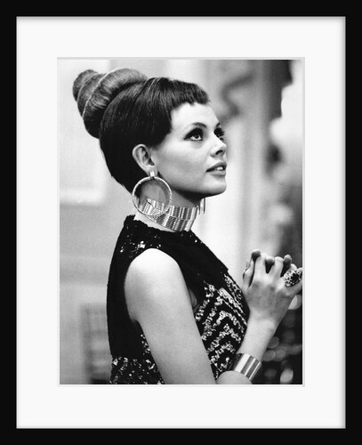 Britt Ekland in earrings by Associated Newspapers