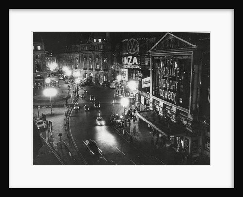 Piccadilly Circus at Night by Associated Newspapers