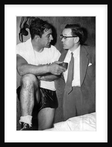 Boxer Rocky Marciano with journalist and commentator Harry Carpenter by Associated Newspapers