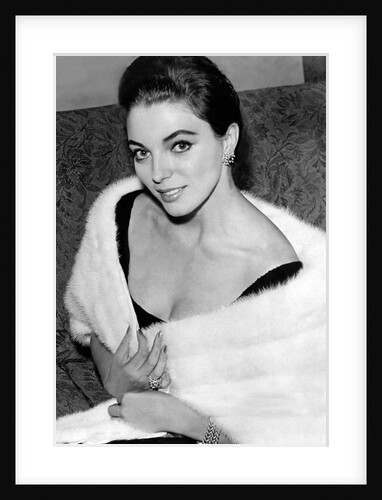 Joan Collins in fur by Associated Newspapers