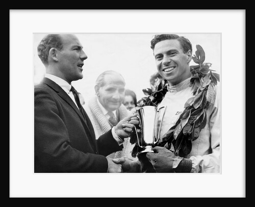 British racing drivers Jim Clark and Stirling Moss by Associated Newspapers