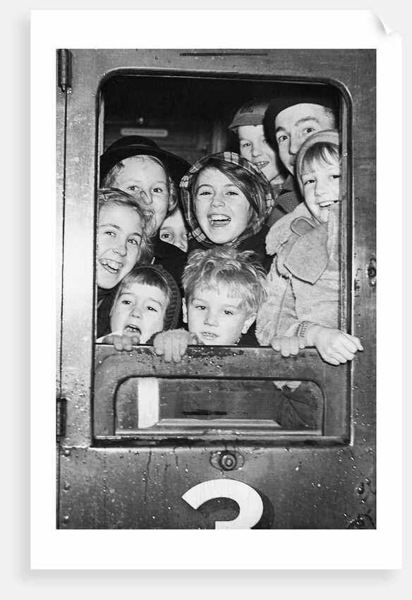 Cheerful train evacuees by Associated Newspapers