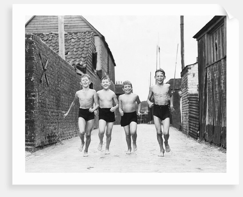 Children off for a swim by Associated Newspapers