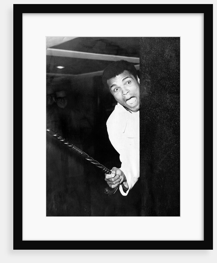 Muhammad Ali larking about at Heathrow by Associated Newspapers