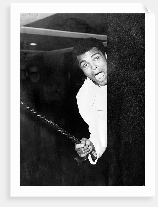 Muhammad Ali larking about at Heathrow by Associated Newspapers