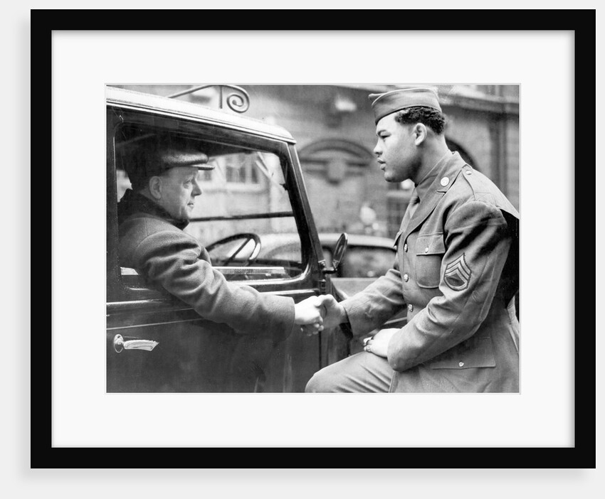 Boxer Joe Louis in uniform by Associated Newspapers