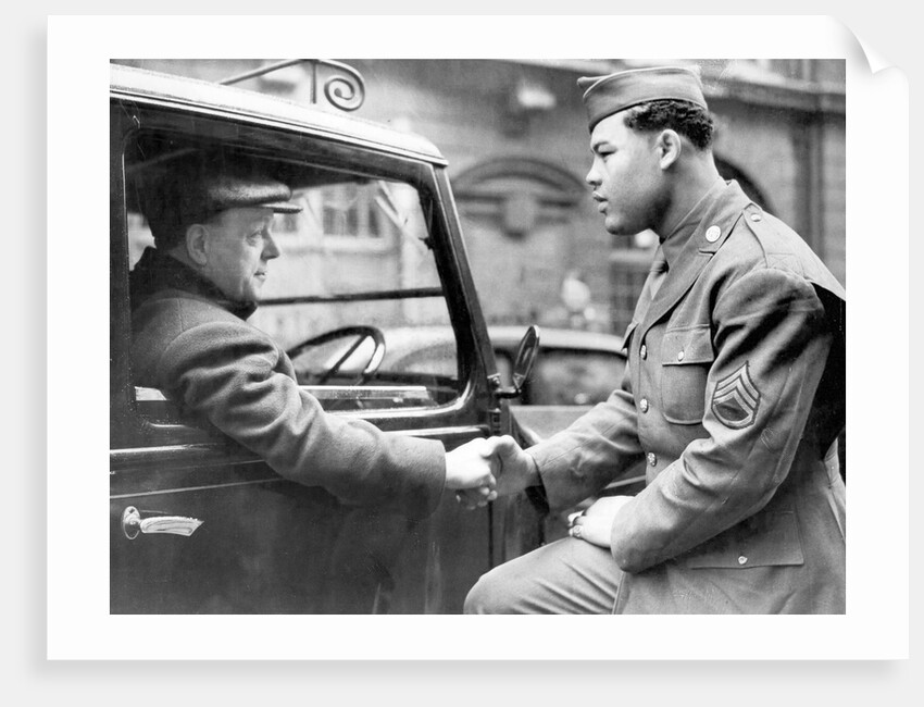 Boxer Joe Louis in uniform by Associated Newspapers