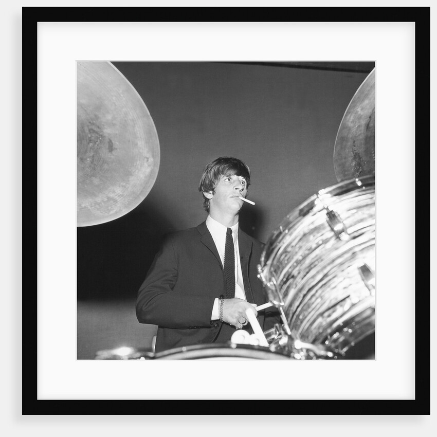 Ringo Starr playing the drums by Associated Newspapers