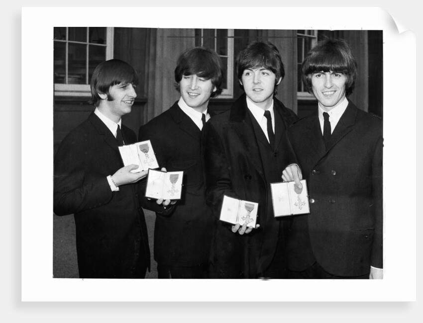 The Beatles show their MBEs by Associated Newspapers