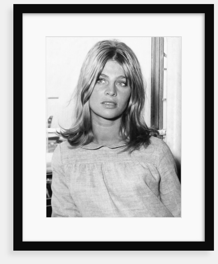Julie Christie at an airport by Associated Newspapers