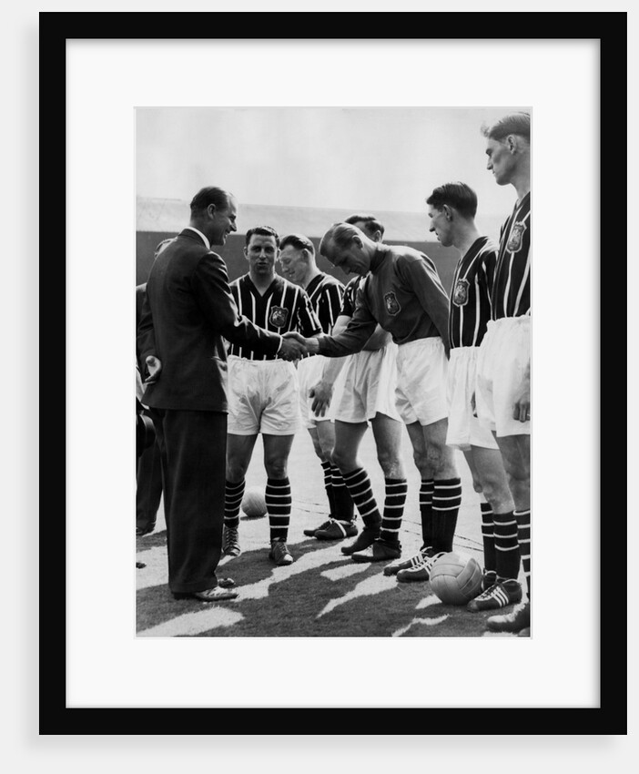 Prince Philip meeting members of Manchester City team by Associated Newspapers