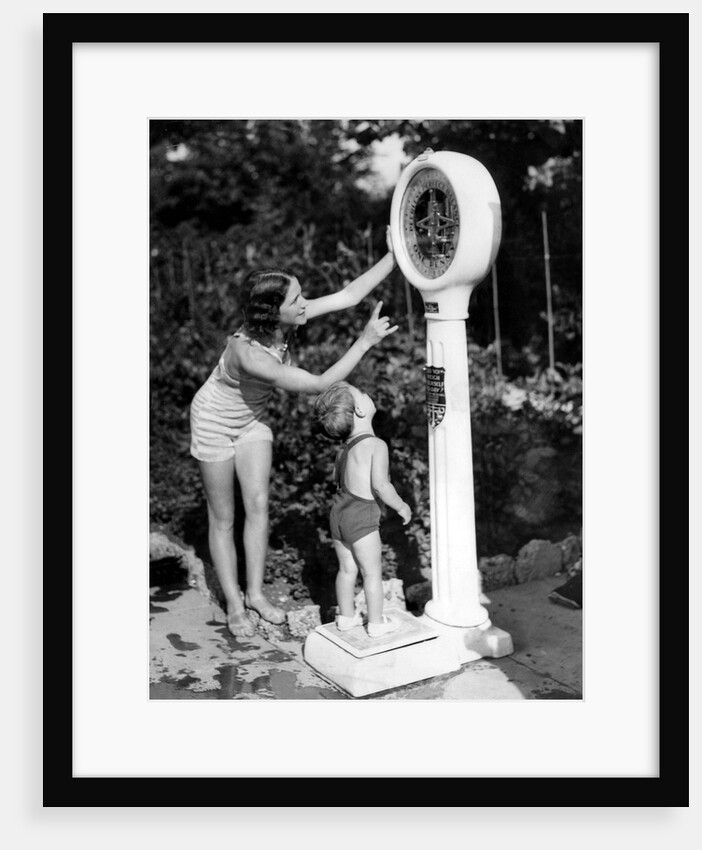 Seaside weighing machine by Associated Newspapers