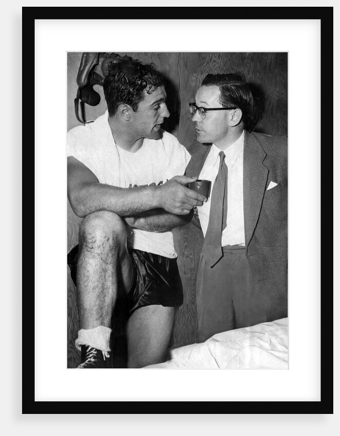 Boxer Rocky Marciano with journalist and commentator Harry Carpenter by Associated Newspapers