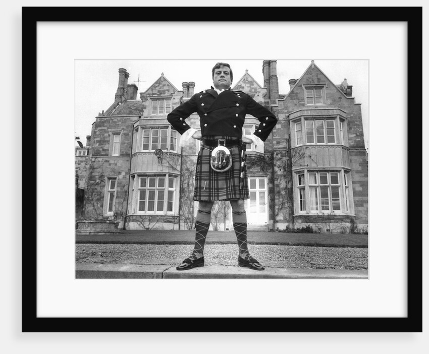 Oliver Reed in kilt by Associated Newspapers