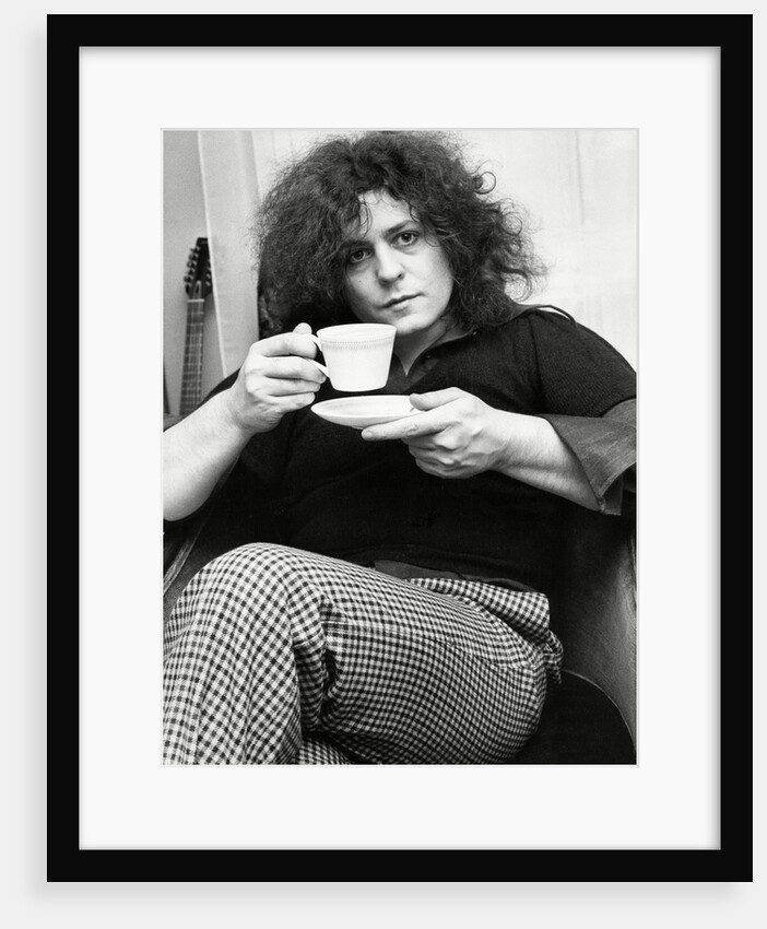 Marc Bolan with a cup of tea by Associated Newspapers