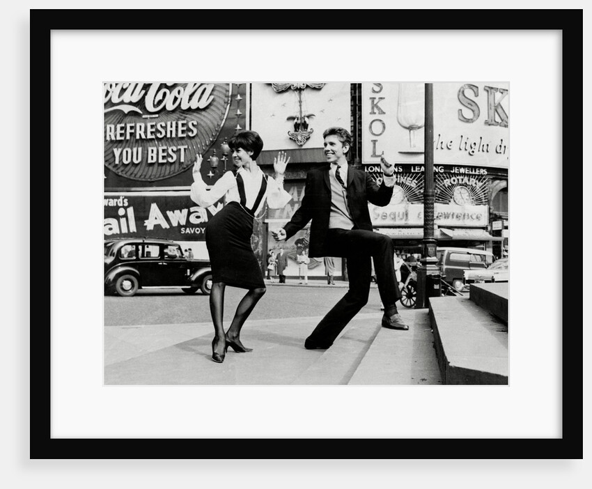 Dancing in Piccadilly Circus by Associated Newspapers