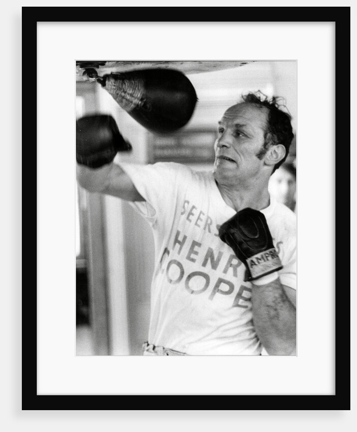 Henry Cooper, boxer, training by Associated Newspapers
