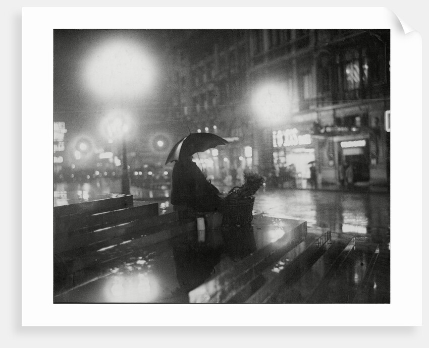 Flower Seller in the rain by Associated Newspapers