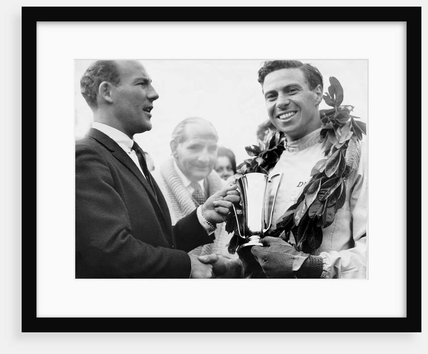 British racing drivers Jim Clark and Stirling Moss by Associated Newspapers