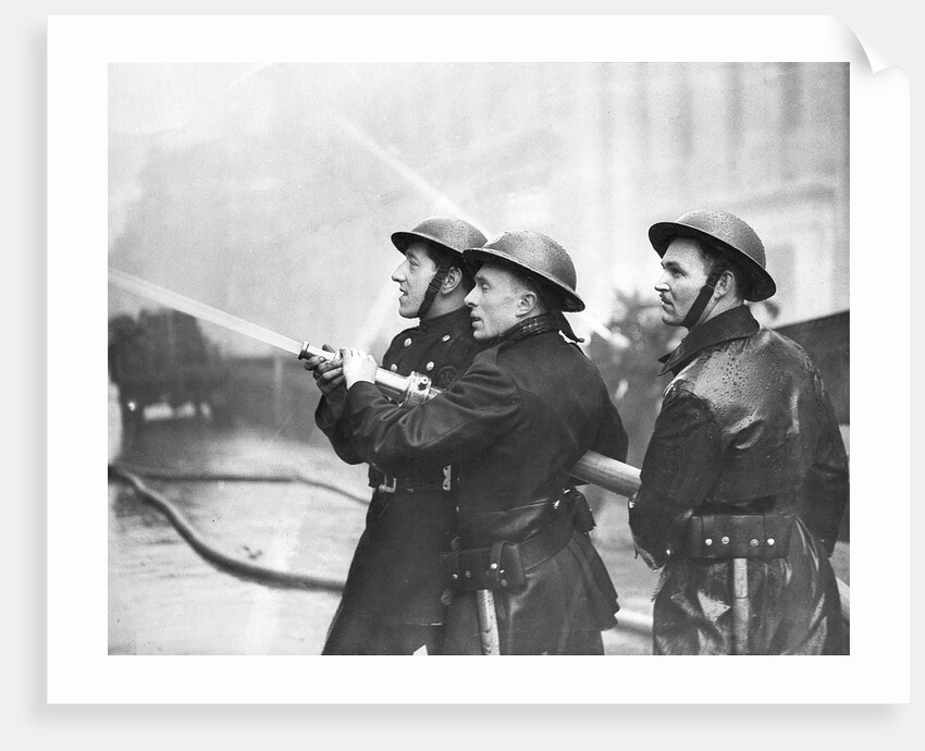 Firefighters morning after air raids London by Associated Newspapers